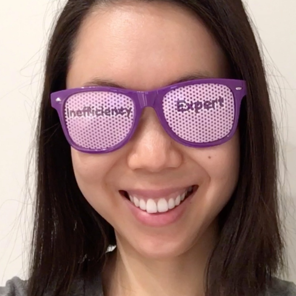 Purple Sunglasses with "Inefficiency Expert" text